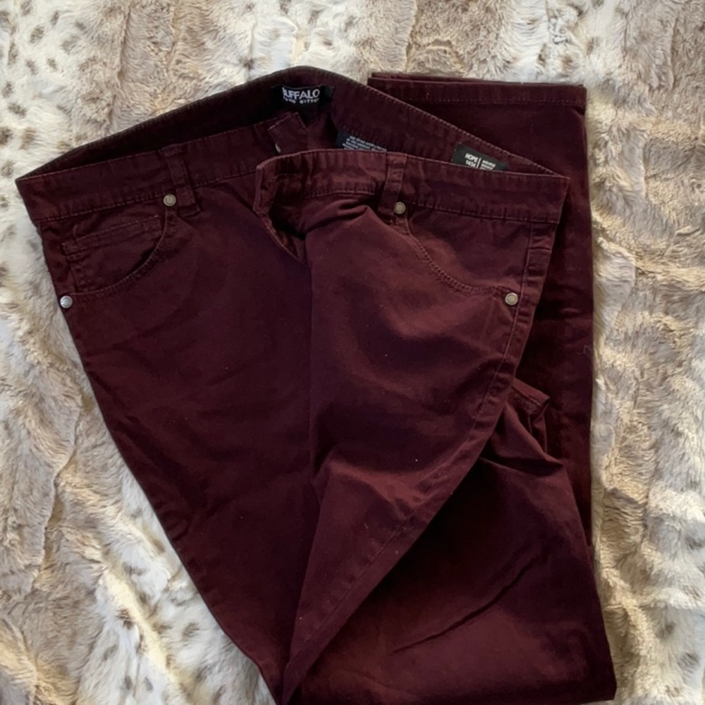 Burgundy buffalo pants. Size 14/34.